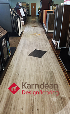 walkway featuring Karndean loose lay plank luxury vinyl plank flooring