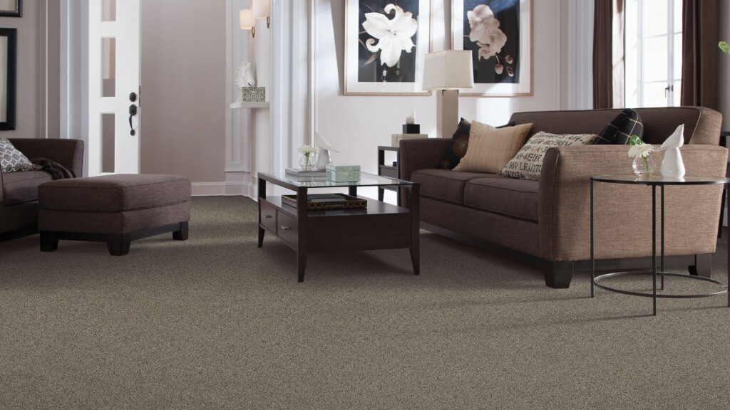 Alluring Antique Ice hand-knotted carpet displayed in an artistic room setting, featuring icy blue and neutral tones with intricate traditional patterns.